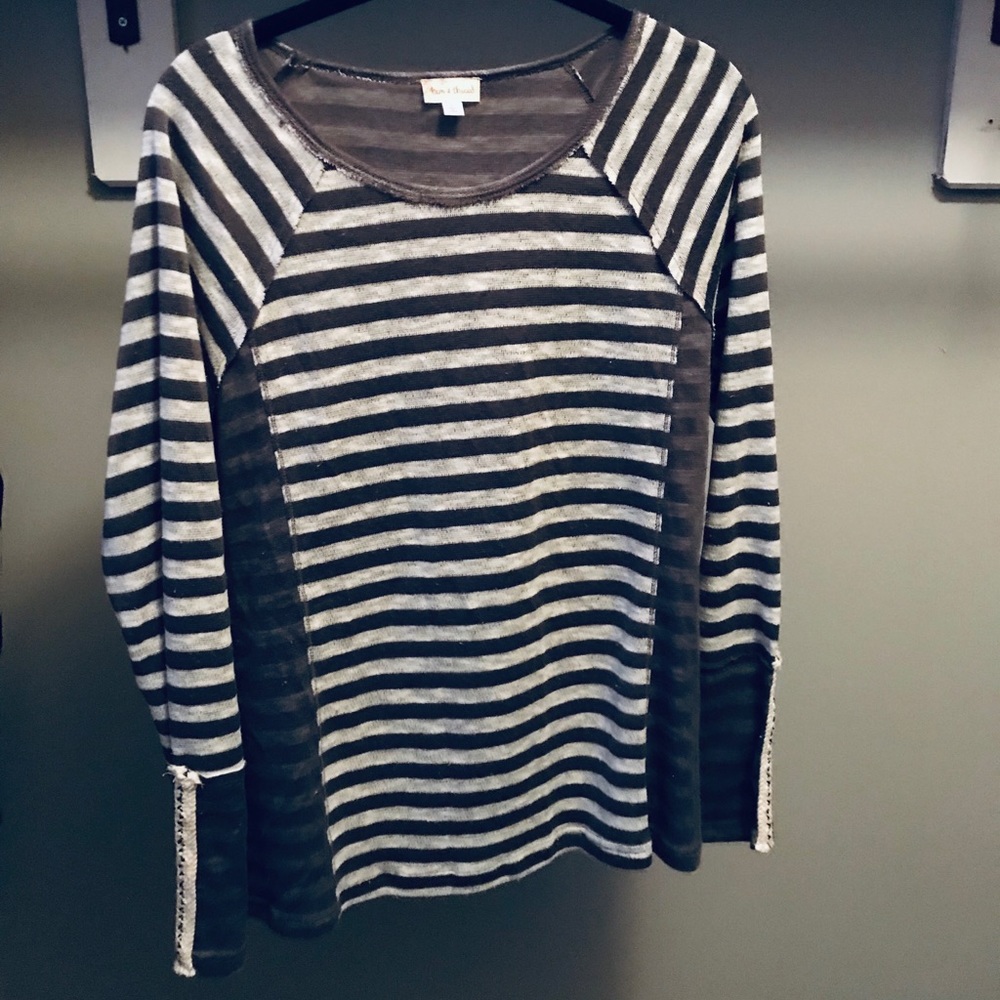 Boutique sweater with unique sleeve embellishment